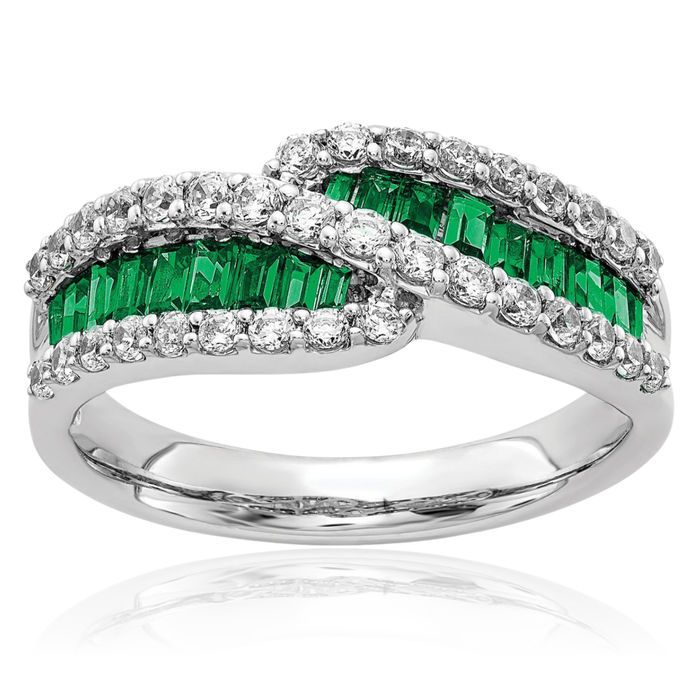 depth of natural emeralds with brilliant-cut diamonds.