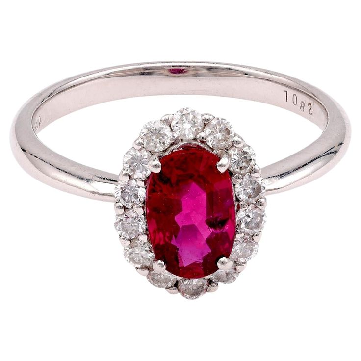 Oval-cut Natural Ruby with diamonds